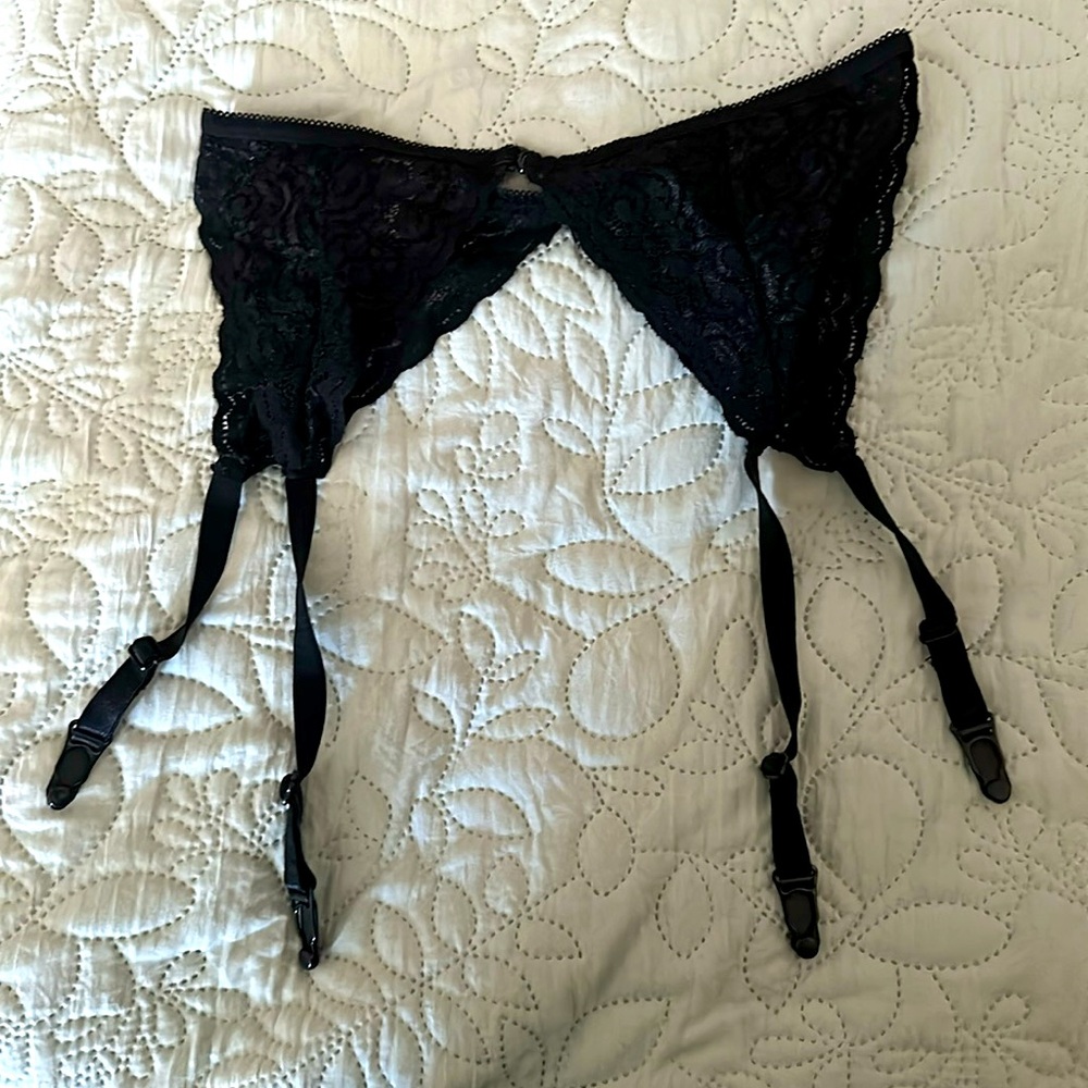 Never worn. Black Lace Garter Belt